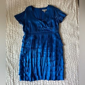 Roaman’s women’s blue shimmer plus size bottom half tiered dress (20W).